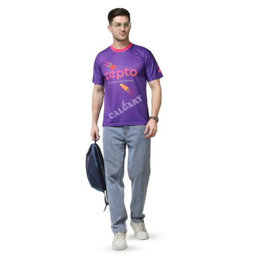 A man wearing a purple Micro Dri-fit corporate t-shirt for Zepto, featuring the logo and "10 Minute Grocery Delivery" text, manufactured by a leading corporate t shirt manufacturer